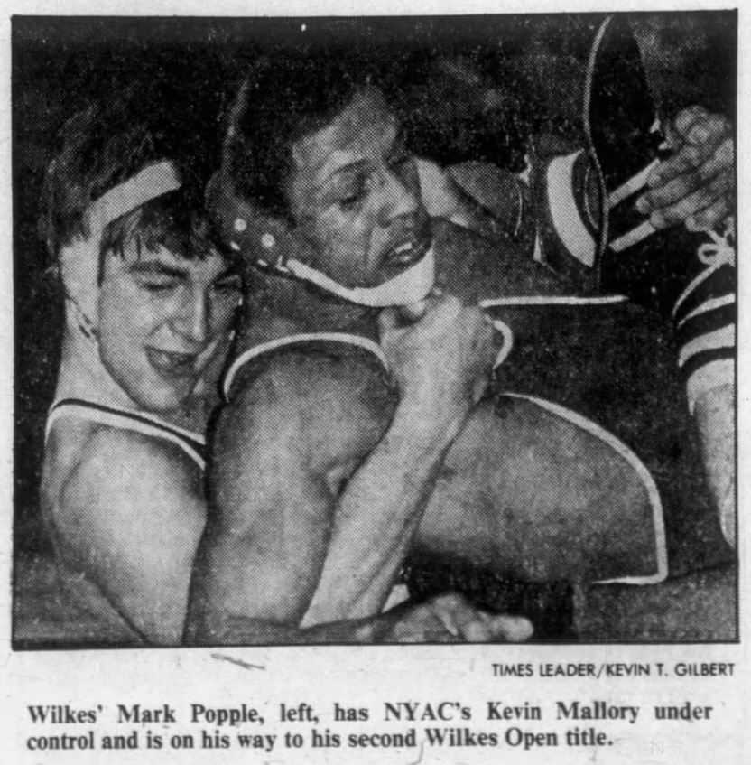 Mark Popple controls Ken Mallory
