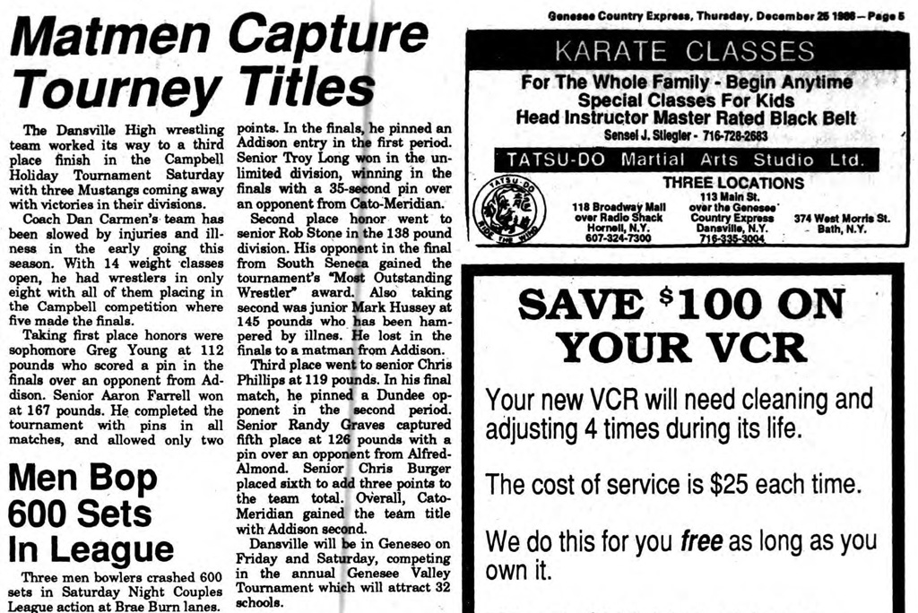 Matmen Capture Tourney Titles