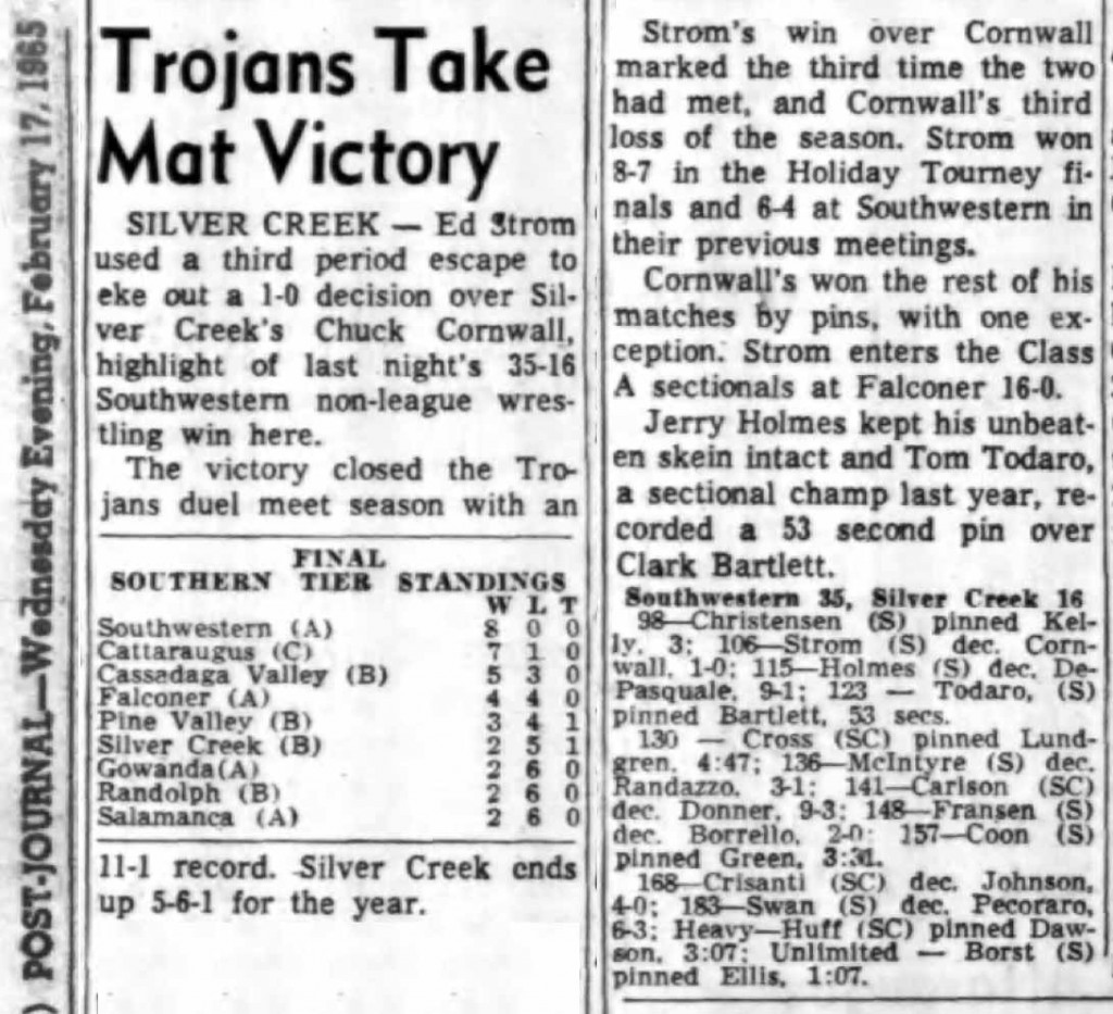 Trojans Take Mat Victory